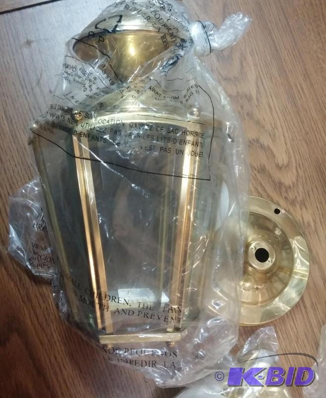 Set of 2 NEW Brass outdoor light fixtures...
