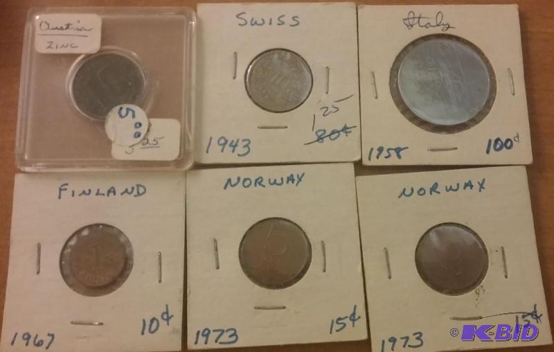 Lot of carded foreign coins...