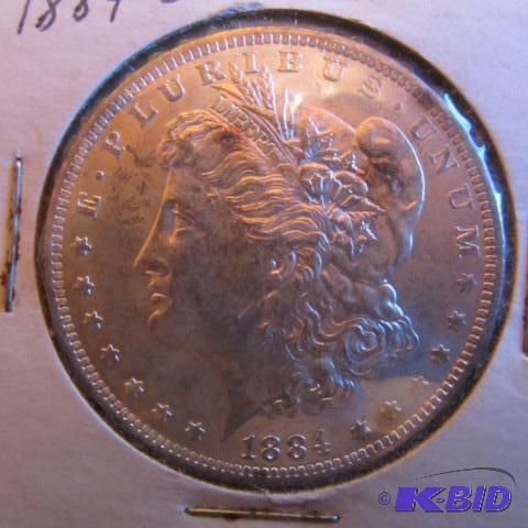 lot 19 image: 1884-O Morgan Silver Dollar