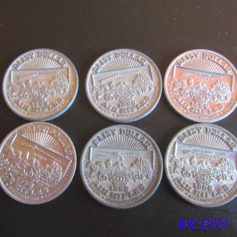 lot 277 image: Daisy Dollar Air Rifle Tokens