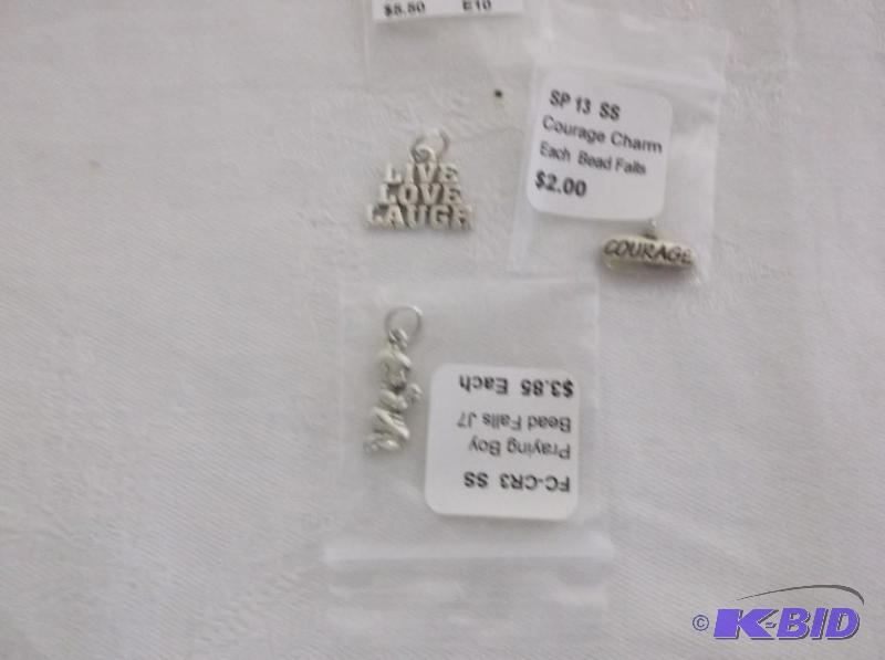 Lot of 3 Sterling silver charms....