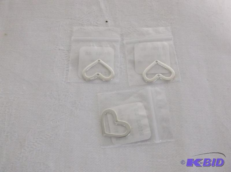 Sterling silver heart charms....