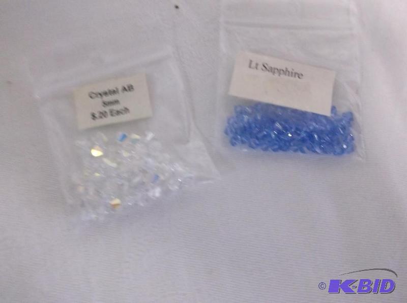5mm Crystal AB and 4mm cubed light sapphire....