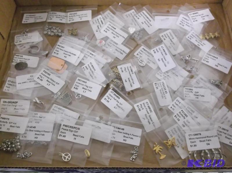 Lot with assortment of bead falls, charms and...