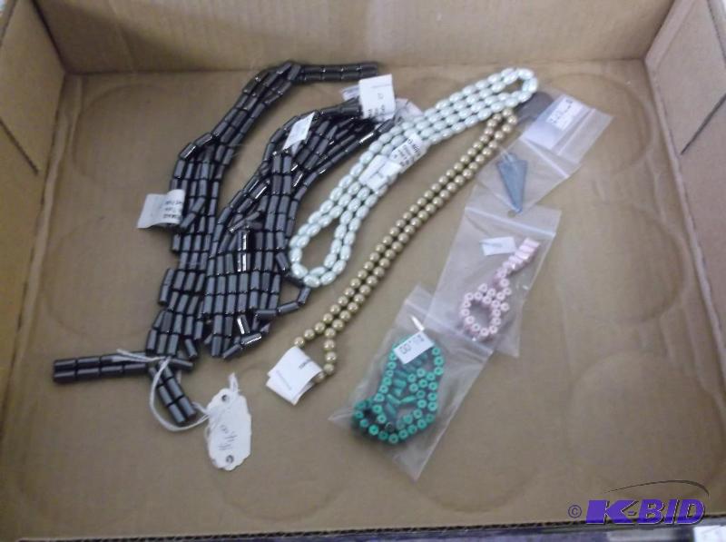 Lot with magnetic beads and assortment of oth...
