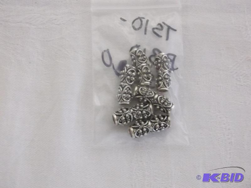 Sterling silver tube beads....