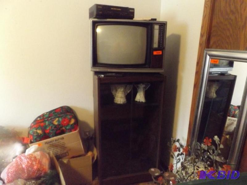 lot 129 image: t.v and vcr and stand ...