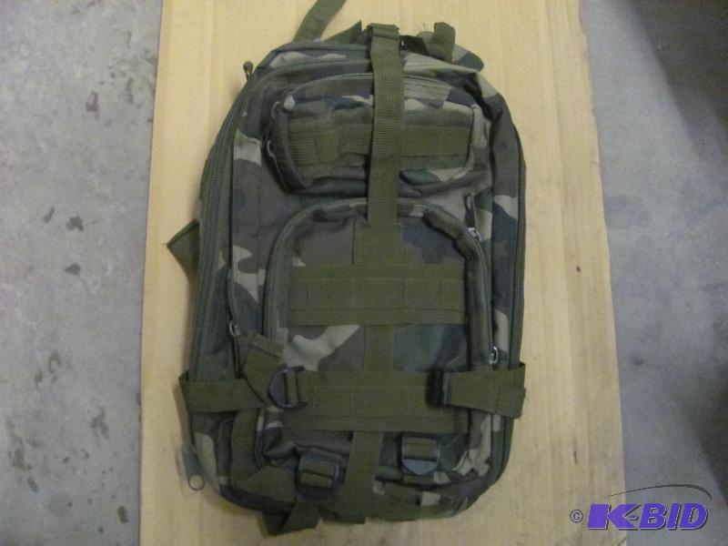 lot 49 image: This Woodland Camo Backpack has shoulder AND ...