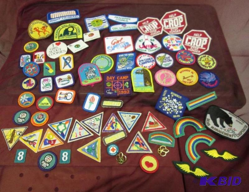 lot 25 image: Girl Scout pins and badges...