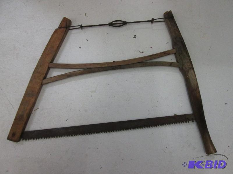 lot 57 image: Antique saw...