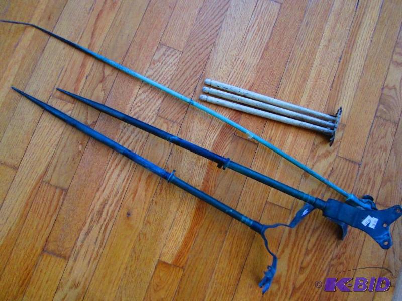 lot 89 image: 3 lightning rods and a 3 prong hanger...