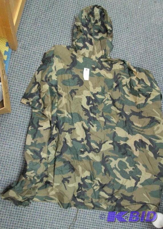 lot 100 image: Large rain poncho camo...