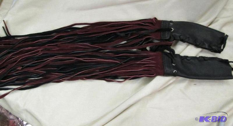 lot 148 image: Arm piece that made with leather and black an...
