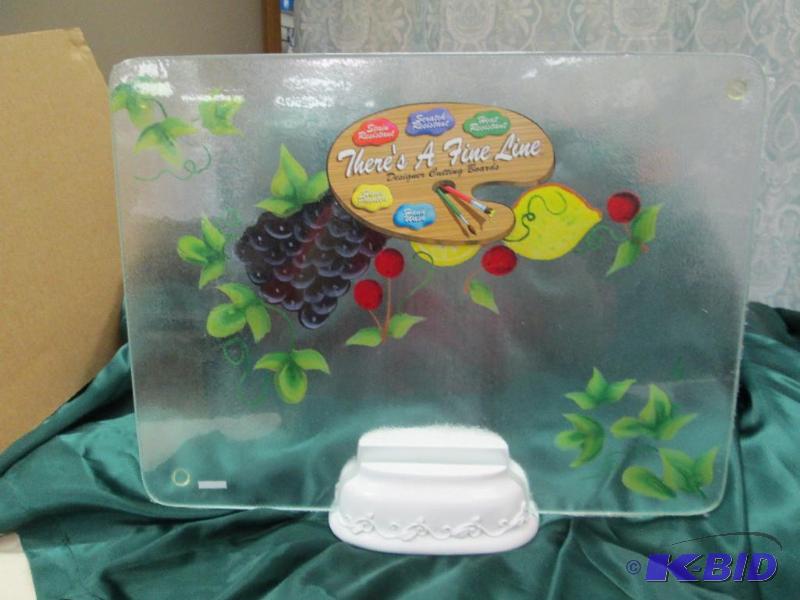 lot 157 image: Glass cutting board and stand...