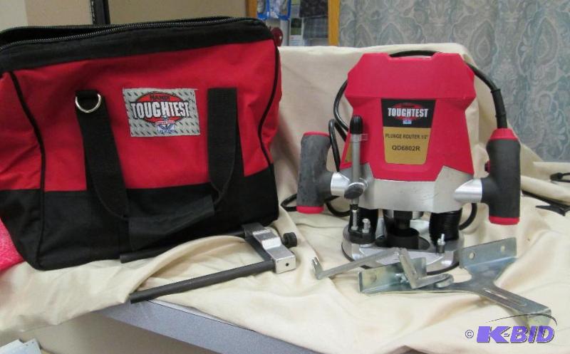 lot 21 image: Handy toughest Plunge Router with bag- untest...