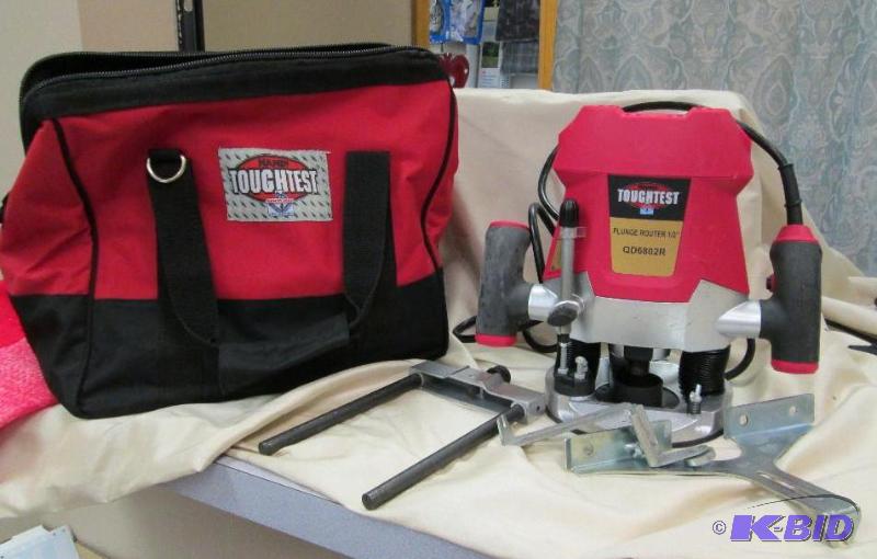 lot 23 image: Handy toughest Plunge Router with bag- untest...