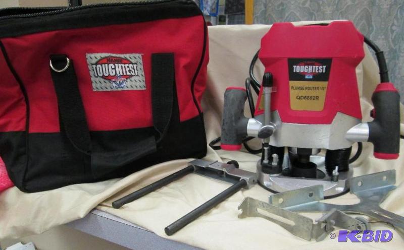 lot 26 image: Handy toughest Plunge Router with bag- untest...