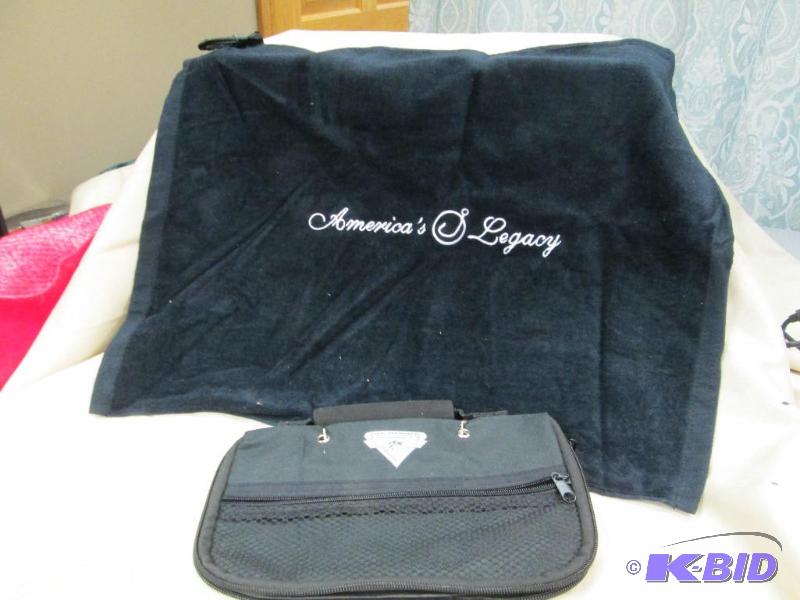 lot 3 image: One fishing golf towel and fishing worm bag...