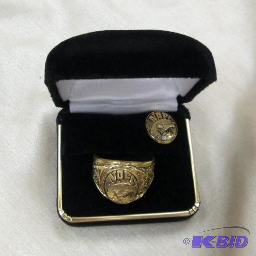 lot 35 image: Mens ring on top is has NAFC with fish on it...