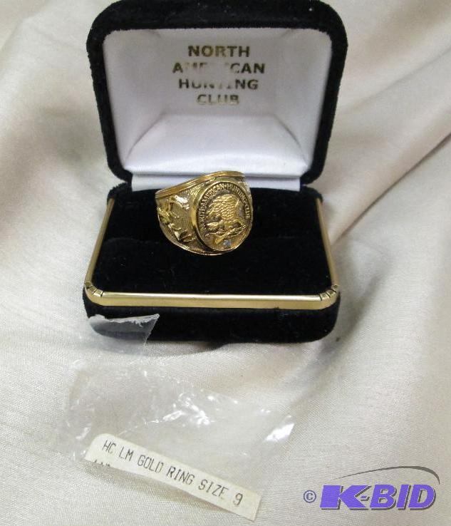 lot 36 image: Mens size 9 ring on top is looks like a eagl...