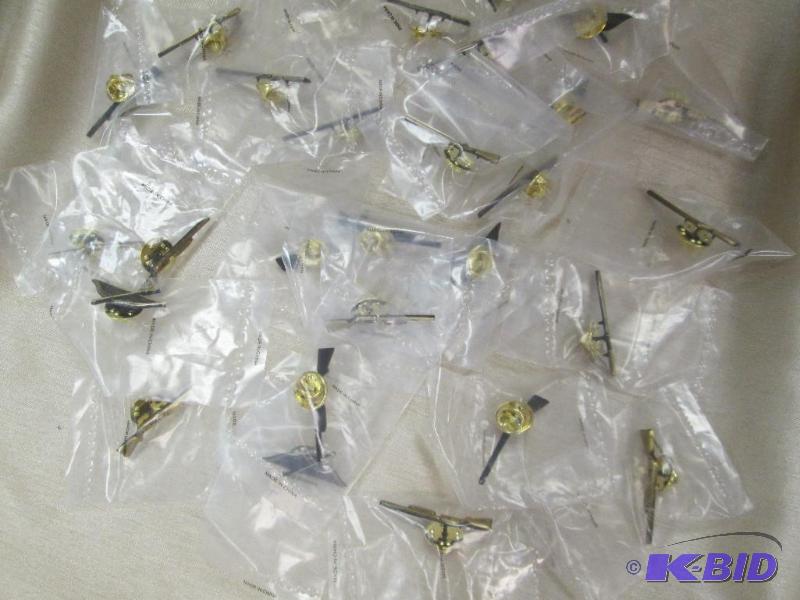 lot 37 image: Qty 28 Hat pins tie tacks it is in a shape o...