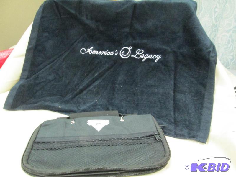 lot 6 image: One fishing golf towel and fishing worm bag...