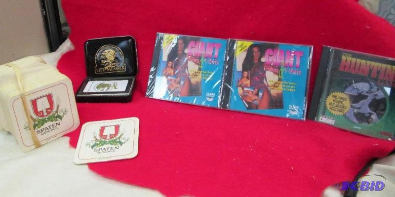 lot 81 image: Spaten beer coasters, deck of card in a tin, ...