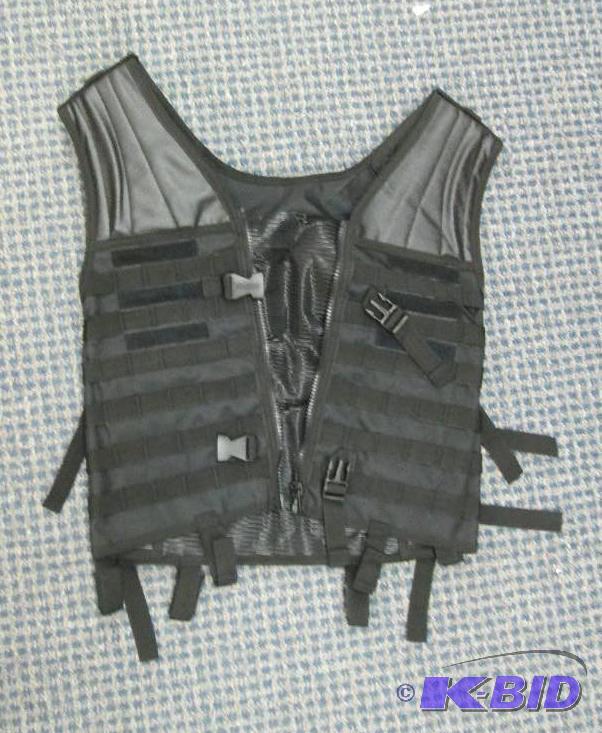 lot 96 image: Black Molle Universal vest (tactical vest)...