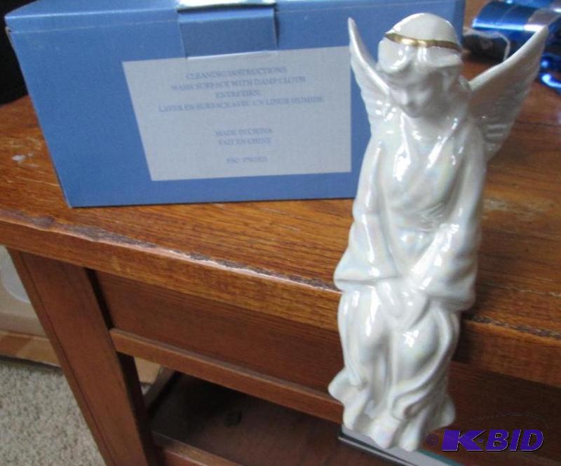 lot 203 image: sitting angel that sists on a shelf...