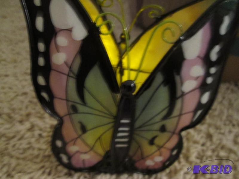 lot 212 image: butterfly candle holder...
