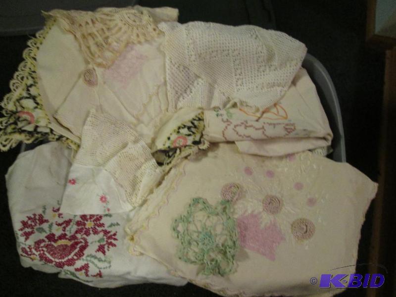 lot 235 image: bin of decorated towels and crossstitched des...