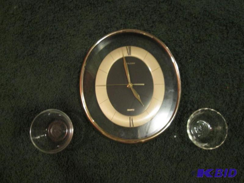 lot 31 image: heirloom quartz clock with 2 glass serving bo...