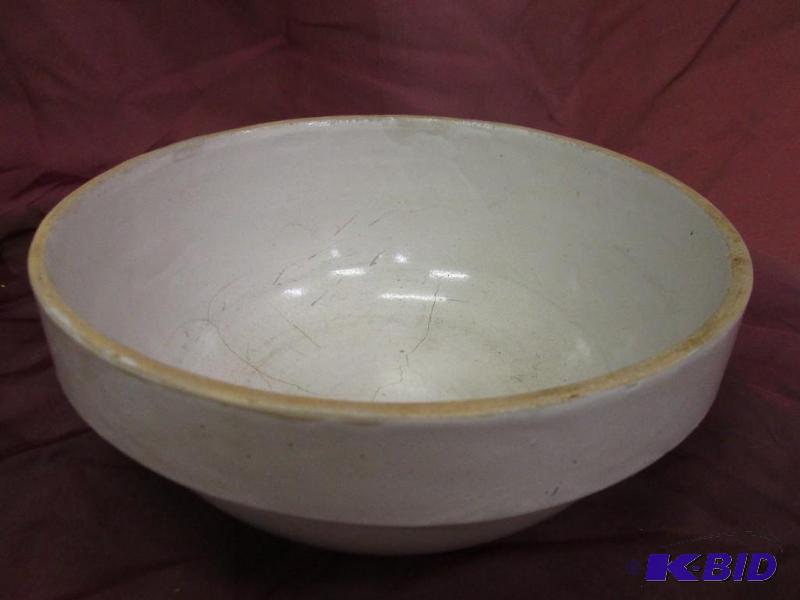 lot 316 image: Tan bowl, has stress cracks, 10 34...