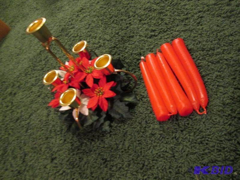 lot 33 image: poinsttia candle center piece, candle include...