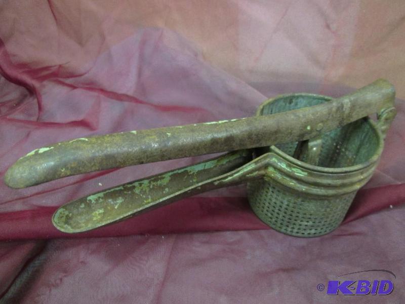 lot 331 image: Vintage potato ricer...