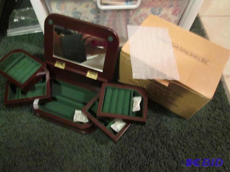 lot 8 image: Avon 2002 mahogany-look swivel jewelry box...