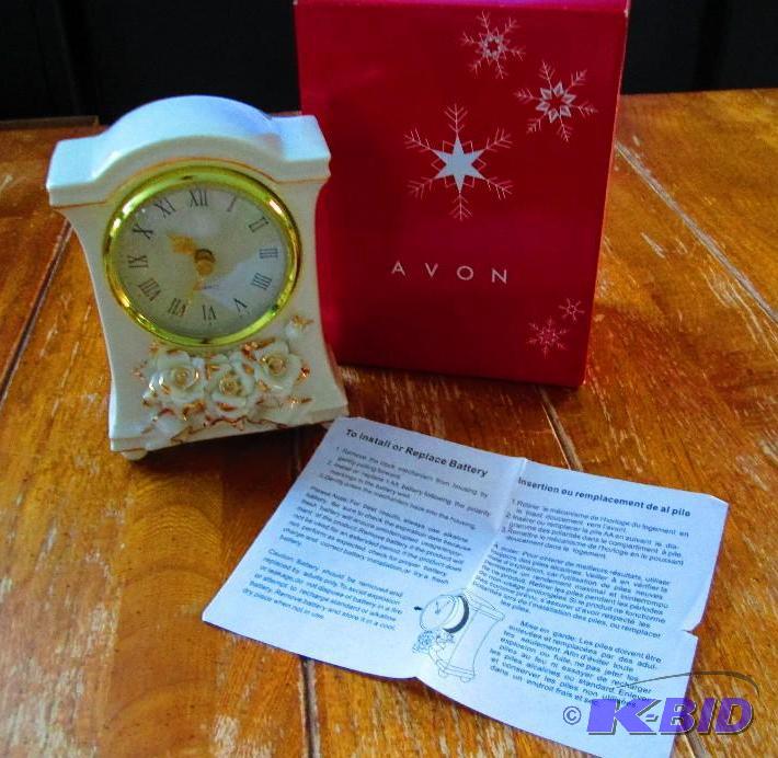 lot 85 image: Avon winter rose clock...