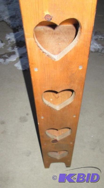 lot 86 image: decorative wooden shelf with heats carved on ...