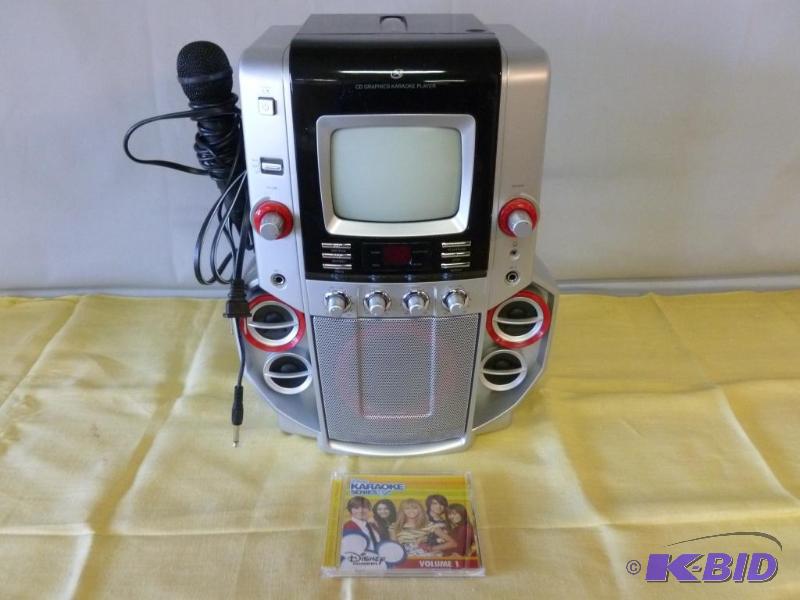 lot 107 image: CD Graphics Karaoke Player Model JM258, comes...