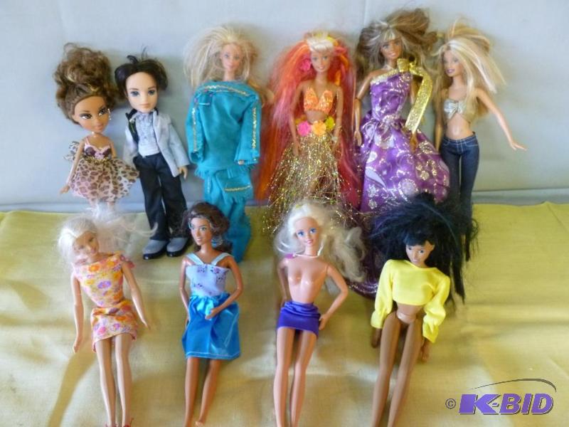 lot 108 image: Large lot of eight collectible Barbie Dolls a...