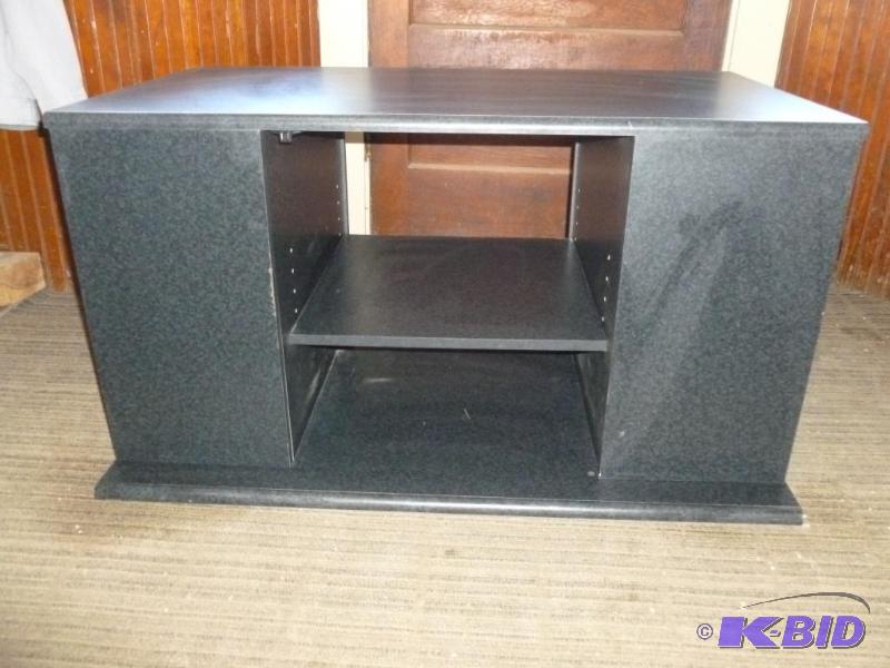 lot 115 image: Wooden flat screen t.v stand that measures 22...