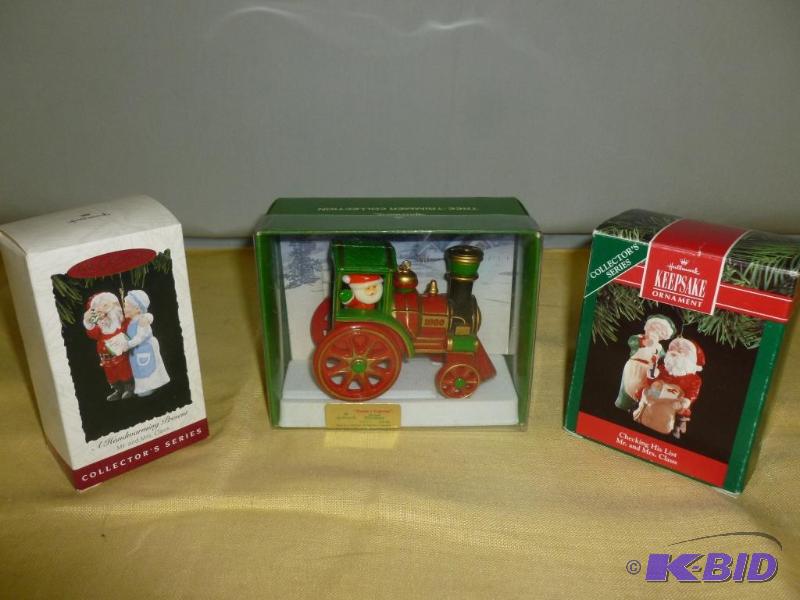 lot 132 image: Lot of three collectible Hallmark Christmas t...
