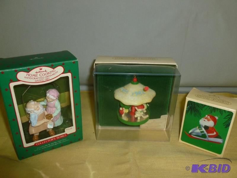 lot 136 image: Lot of three collectible Hallmark Christmas t...