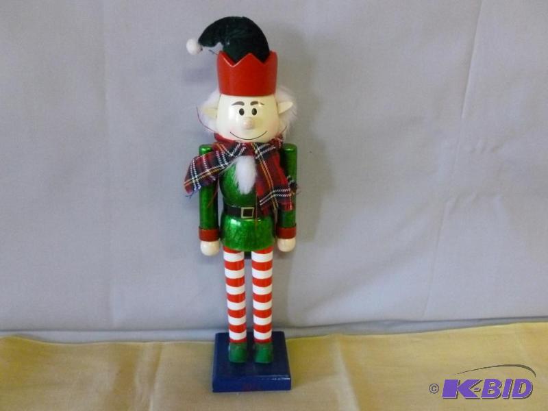 lot 42 image: Nice wooden nut cracker that measures 15"...