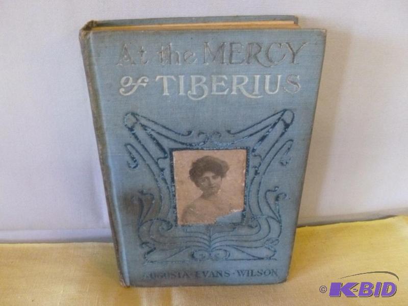 lot 67 image: Antique Book - At The Mercy Of Tiberius - 188...