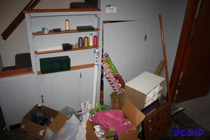 Corner Lot Including Organizational Shelves, Culligan Bottle, Vaccuum Cleaner, And More.