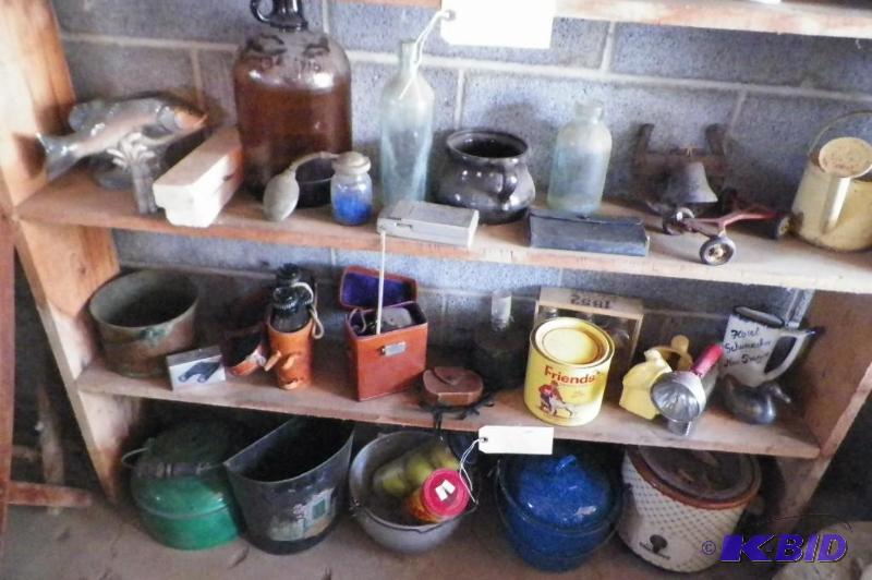 Items on 2 shelves and ground