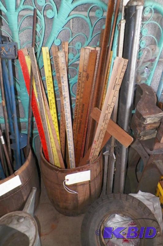 Old Nail Keg full of old yard sticks