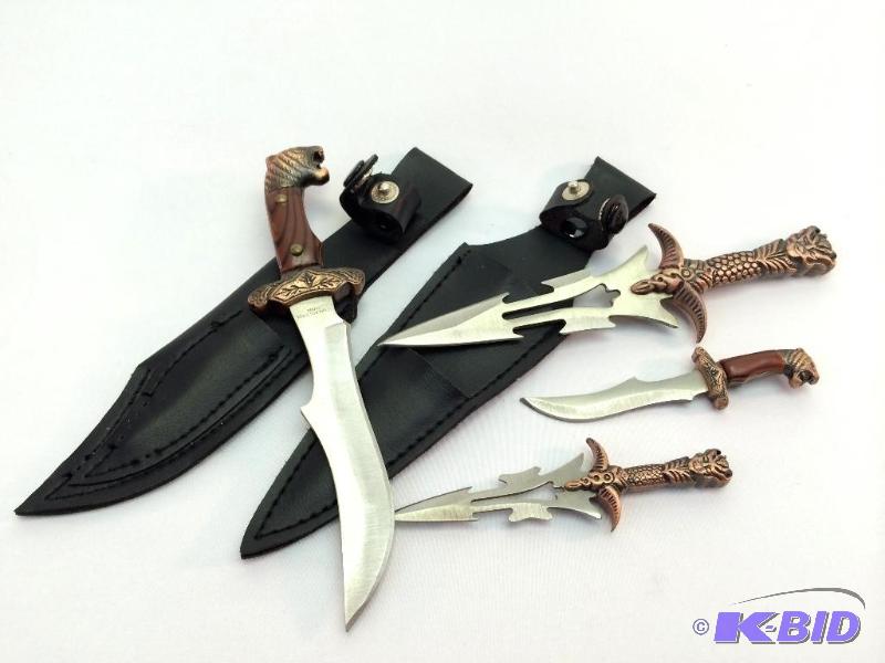 Four Fantasy Knives wSheaths.  Largest knife is 3 12 Blade.