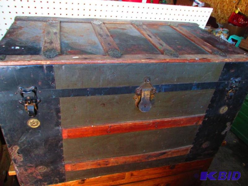 Brown wood trunk with metal trim. 34 x 19&quo...